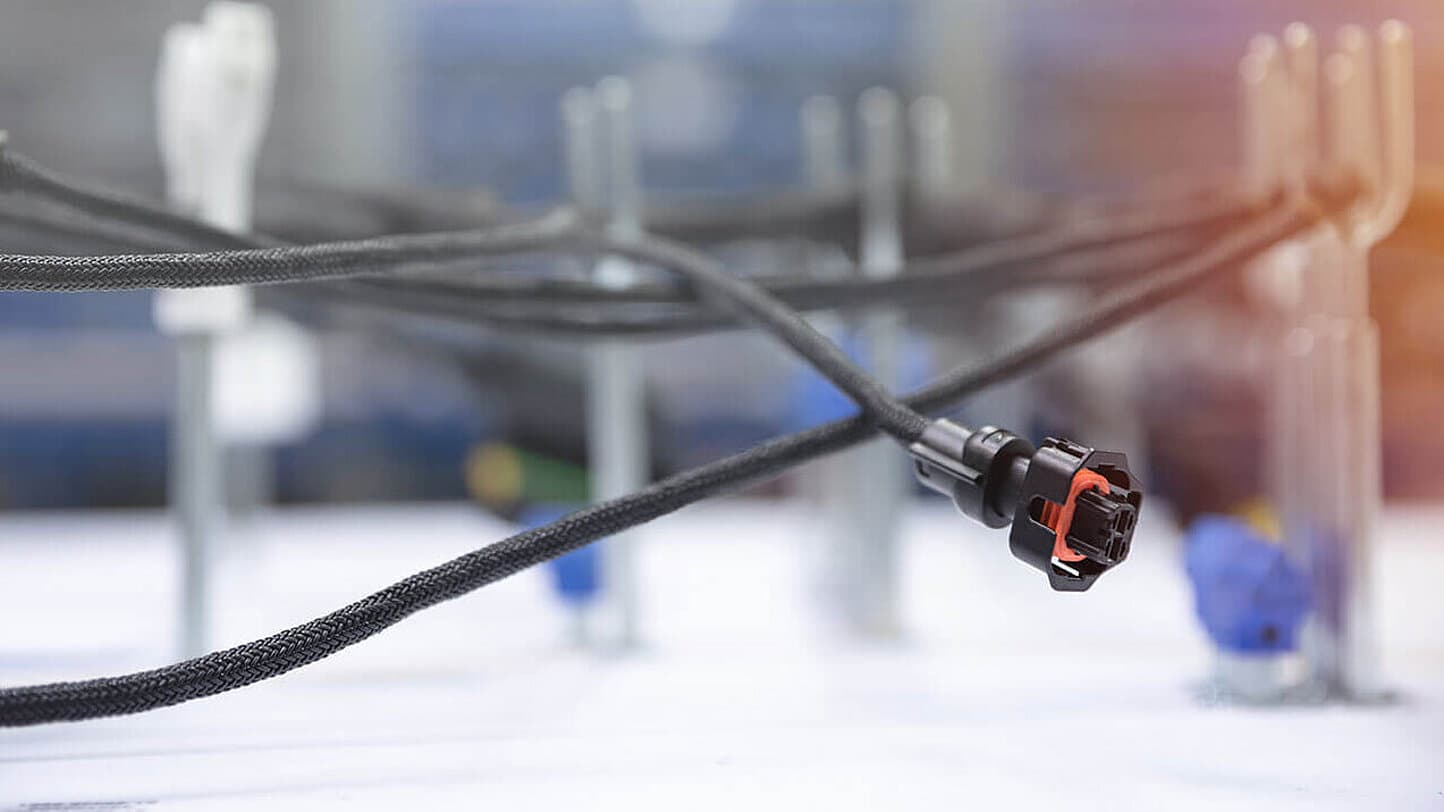 Braided cable protection with black connector
