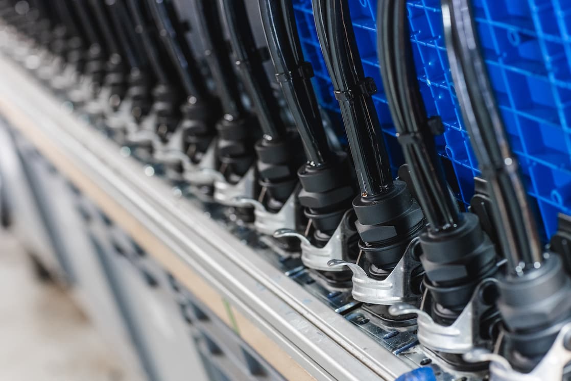 Row of black cable outlets during potting