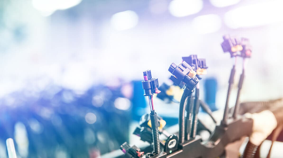 Wiring harness with connectors in production